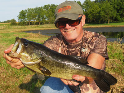 Man holding a largemouth bass